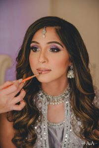 Glamorous wedding day makeup with voluminous hair